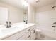 Bathroom with double vanity, tub, and shower at 134 Henley St, Canton, GA 30114