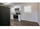 Updated kitchen with stainless steel appliances and granite countertops at 6230 Kensington Ct, Austell, GA 30106