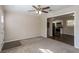 Open living room with a view into the updated kitchen at 6230 Kensington Ct, Austell, GA 30106