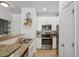 Modern kitchen with stainless steel appliances and granite countertops at 10 Perimeter Summit Ne Blvd # 4435, Brookhaven, GA 30319