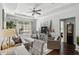 Relaxing living room with ample natural light, comfortable seating, and hardwood floors at 10 Perimeter Summit Ne Blvd # 4435, Brookhaven, GA 30319