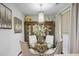 Bright dining area with glass-top table and four upholstered chairs at 10 Perimeter Summit Ne Blvd # 4435, Brookhaven, GA 30319