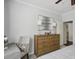 Main bedroom with dresser, large windows and ceiling fan at 10 Perimeter Summit Ne Blvd # 4435, Brookhaven, GA 30319