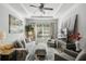 Bright and airy living room with a comfortable seating area and large windows at 10 Perimeter Summit Ne Blvd # 4435, Brookhaven, GA 30319