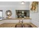 Kitchen features granite countertops, double sink, and a view into the dining area at 10 Perimeter Summit Ne Blvd # 4435, Brookhaven, GA 30319