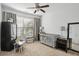 Charming bedroom with a crib, large window, and carpeted floor at 10 Perimeter Summit Ne Blvd # 4435, Brookhaven, GA 30319