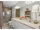 Elegant bathroom with double sinks, granite countertops, and a large walk-in shower at 10 Perimeter Summit Ne Blvd # 4435, Brookhaven, GA 30319