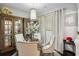 Elegant dining room with glass table and four chairs, great for entertaining at 10 Perimeter Summit Ne Blvd # 4435, Brookhaven, GA 30319