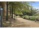 Scenic walking path surrounded by lush landscaping at 10 Perimeter Summit Ne Blvd # 4435, Brookhaven, GA 30319