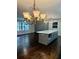 Kitchen island with white quartz countertop and gray cabinets at 2534 Creekview Sw Dr, Marietta, GA 30008