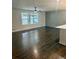 Bright and airy living room with hardwood floors at 2534 Creekview Sw Dr, Marietta, GA 30008