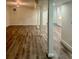 Spacious finished basement with LVP flooring and neutral walls at 2534 Creekview Sw Dr, Marietta, GA 30008
