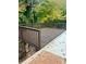 Elevated wooden deck with railing overlooking backyard at 2534 Creekview Sw Dr, Marietta, GA 30008