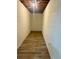 Clean, spacious basement storage area with vinyl flooring at 2534 Creekview Sw Dr, Marietta, GA 30008