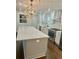 Modern kitchen with white cabinets and quartz countertops at 2534 Creekview Sw Dr, Marietta, GA 30008