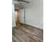 Simple bedroom with LVP flooring and ceiling fan at 2534 Creekview Sw Dr, Marietta, GA 30008