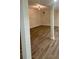 Spacious finished basement with LVP flooring and neutral walls at 2534 Creekview Sw Dr, Marietta, GA 30008