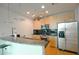 Modern kitchen with stainless steel appliances and granite countertops at 400 W Peachtree Nw St # 1713, Atlanta, GA 30308