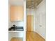 Entryway with built-in cabinets, granite countertop, and hardwood floors at 400 W Peachtree Nw St # 1713, Atlanta, GA 30308