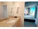 Bathroom with granite countertop, single sink, and view of bedroom at 400 W Peachtree Nw St # 1713, Atlanta, GA 30308