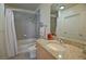 Bathroom with granite countertop, tub, shower, and toilet at 400 W Peachtree Nw St # 1713, Atlanta, GA 30308
