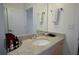 Bathroom with granite countertop, single sink, and modern fixtures at 400 W Peachtree Nw St # 1713, Atlanta, GA 30308