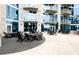 Outdoor patio area with seating for residents at 400 W Peachtree Nw St # 1713, Atlanta, GA 30308