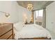Bright bedroom with city view, large bed, and modern dresser at 400 W Peachtree Nw St # 1713, Atlanta, GA 30308