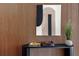 Wood paneled accent wall with artwork and record player at 1281 Avalon Ne Pl, Atlanta, GA 30306