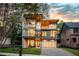 Stunning modern home exterior with a two-car garage and a sleek design at 1281 Avalon Ne Pl, Atlanta, GA 30306