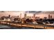 Aerial view of Atlanta's skyline at sunset, with buildings and a transit line at 1281 Avalon Ne Pl, Atlanta, GA 30306