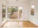 Light-filled bedroom with hardwood floors and large windows at 1281 Avalon Ne Pl, Atlanta, GA 30306
