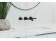 Bathroom vanity with black matte fixtures and vessel sink at 1281 Avalon Ne Pl, Atlanta, GA 30306