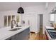 Modern kitchen with gray cabinets, white countertops and a walk-in pantry at 1281 Avalon Ne Pl, Atlanta, GA 30306