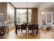 Modern dining room with large windows and hardwood floors at 1281 Avalon Ne Pl, Atlanta, GA 30306