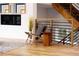 Modern living area with hardwood floors and a stylish chair at 1281 Avalon Ne Pl, Atlanta, GA 30306