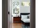 Bright bedroom with mid-century modern furniture and hardwood floors at 1281 Avalon Ne Pl, Atlanta, GA 30306