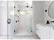 Spa-like bathroom with walk-in shower and marble tile at 1281 Avalon Ne Pl, Atlanta, GA 30306