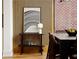 Dining room features wood wall paneling and a modern console table at 1281 Avalon Ne Pl, Atlanta, GA 30306