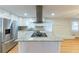 Renovated kitchen with island, stainless steel appliances, and granite countertops at 6234 Melrose St, Douglasville, GA 30134