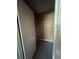 Small closet with a single shelf and rod at 8596 Creekwood Way, Jonesboro, GA 30238