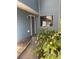 Townhouse entrance with walkway and landscaping at 8596 Creekwood Way, Jonesboro, GA 30238