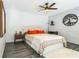 Bright bedroom with ceiling fan, hardwood floors and tree decor at 400 17Th Nw St # 2431, Atlanta, GA 30363