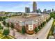 Modern building exterior with city skyline in the background at 400 17Th Nw St # 2431, Atlanta, GA 30363