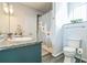 Clean bathroom with granite countertop, single sink, and a shower/tub combo at 400 17Th Nw St # 2431, Atlanta, GA 30363