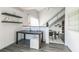 Modern home office with built-in shelving and view to dining area at 400 17Th Nw St # 2431, Atlanta, GA 30363
