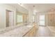 Large bathroom featuring granite countertops, a bathtub, and a shower at 1851 Furlong Run, Lawrenceville, GA 30043