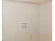 Laundry area with hookups and overhead shelving at 1851 Furlong Run, Lawrenceville, GA 30043