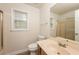 Clean bathroom with shower, toilet and vanity at 1851 Furlong Run, Lawrenceville, GA 30043