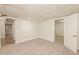 Unfinished basement with carpeted floors at 1851 Furlong Run, Lawrenceville, GA 30043